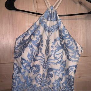 Long, light blue/tan formal dress.